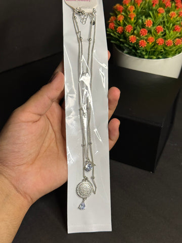 silver-colored fashion necklace